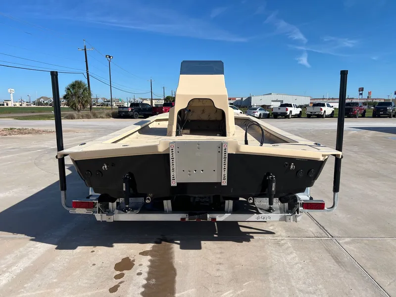 Slide: The Image of 2026 Shoalwater 23' Catamaran on a parking lot. - 10