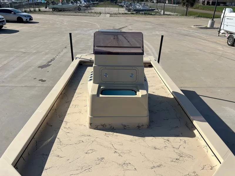 Slide: The Image of 2026 Shoalwater 23' Catamaran on a parking lot. - 13