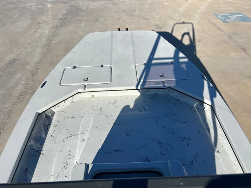 Slide: The Image of Deck of a 2026 Shoalwater 23' Catamaran with shadow and storage compartments. - 12