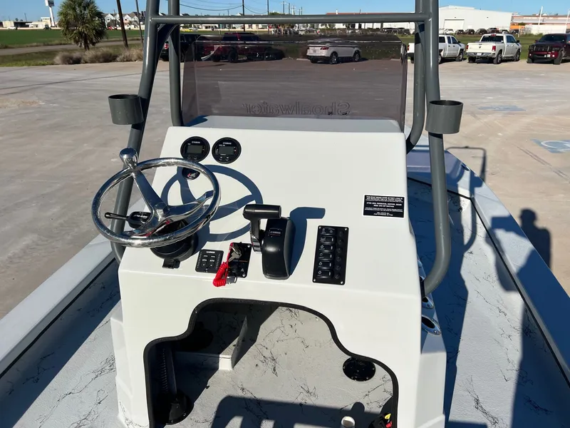 Slide: The Image of Helm console of a 2026 Shoalwater 23' Catamaran. - 14
