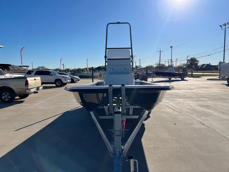 Slide: The Image of 2026 Shoalwater 23' Catamaran on a parking lot under sunny skies. - 5