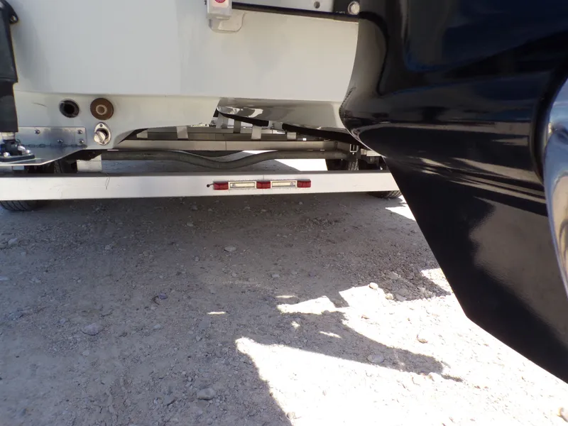 Slide: The Image of Underside of a 2025 Shoalwater 23' Catamaran on a trailer. - 11