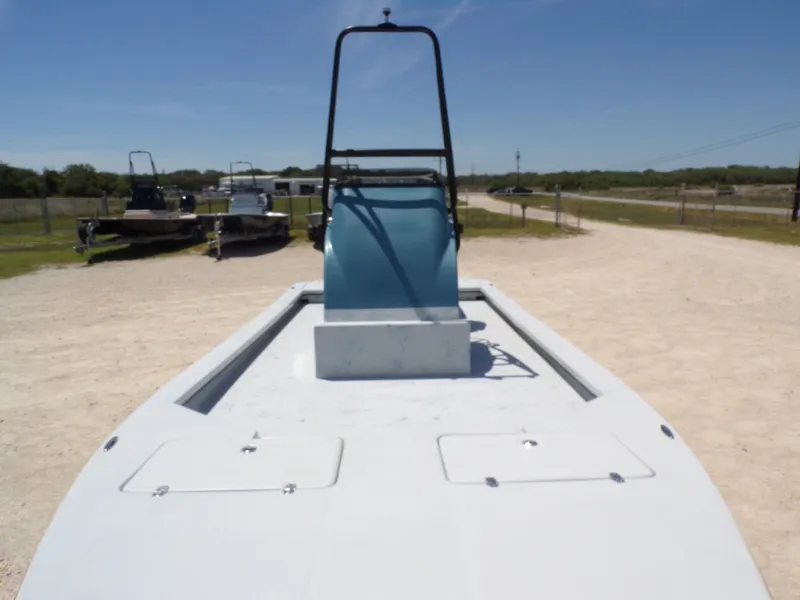 Slide: The Image of 2025 Shoalwater 23' Catamaran on a sandy terrain. - 14