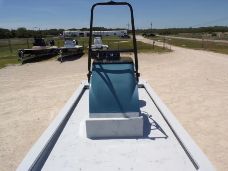 Slide: The Image of 2025 Shoalwater 23' Catamaran parked on sandy terrain. - 15