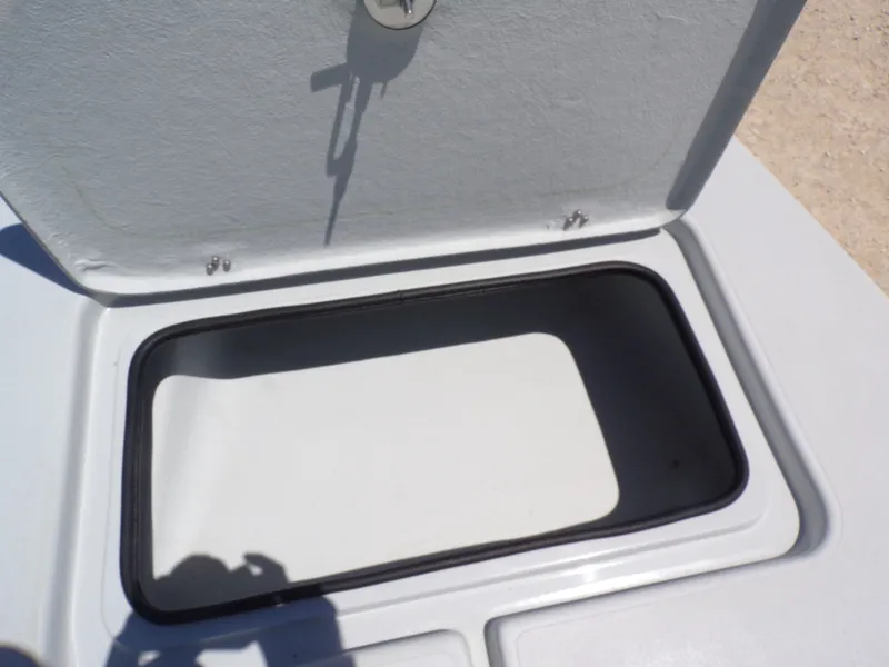 Slide: The Image of Open storage compartment on a 2025 Shoalwater 23' Catamaran. - 20