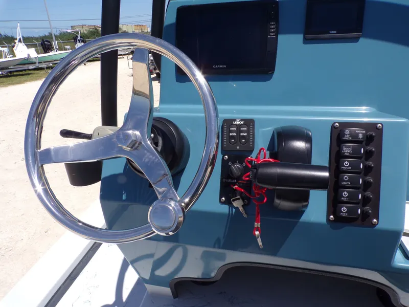 Slide: The Image of Control console of a 2025 Shoalwater 23' Catamaran. - 26
