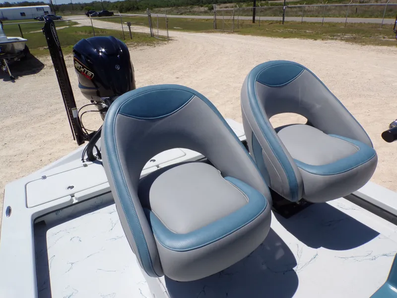 Slide: The Image of Two seats on a 2025 Shoalwater 23' Catamaran. - 27