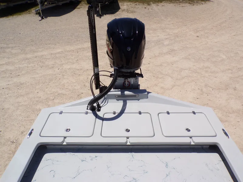 Slide: The Image of Rear view of a Shoalwater 23' Catamaran with outboard motor, 2025 model. - 30