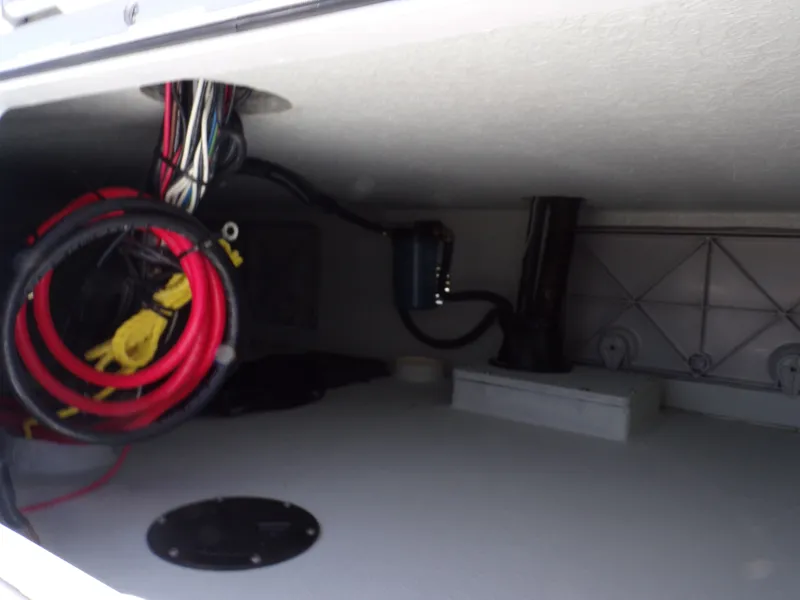 Slide: The Image of Interior of a 2025 Shoalwater 23' Catamaran with cables. - 37