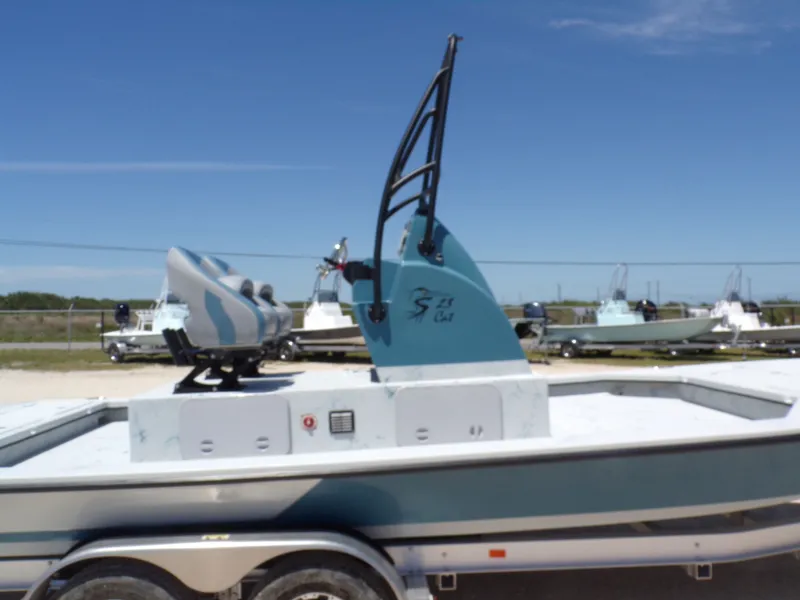 Slide: The Image of 2025 Shoalwater 23' Catamaran on trailer, blue sky. - 38