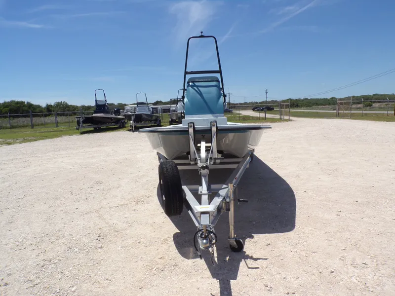 Slide: The Image of 2025 Shoalwater 23' Catamaran on trailer, sunny day. - 5