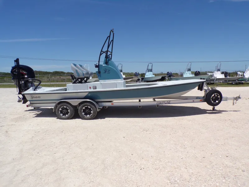 Slide: The Image of 2025 Shoalwater 23' Catamaran on trailer, side view. - 8
