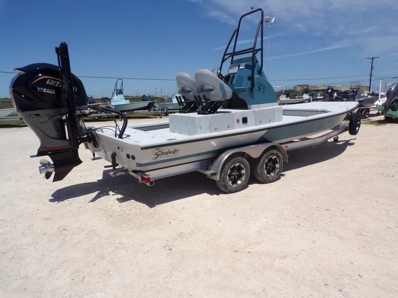 Slide: The Image of 2025 Shoalwater 23' Catamaran with Yamaha outboard motor. - 9