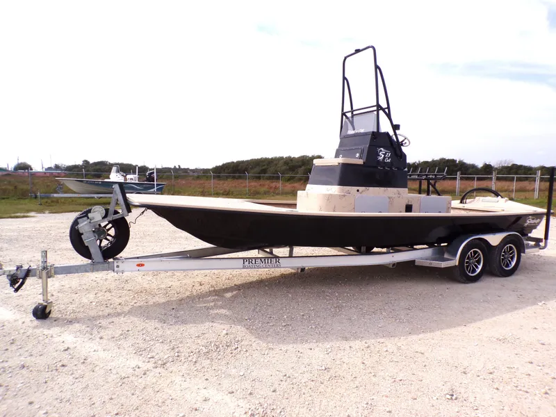 The Image of 2026 Shoalwater 23' Catamaran on trailer outdoors. - 1