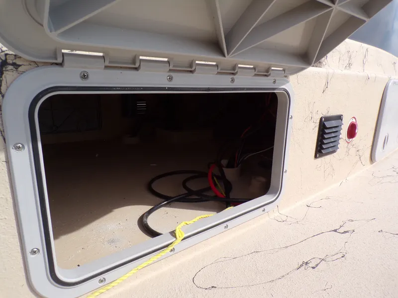 Slide: The Image of Open compartment of a 2026 Shoalwater 23' Catamaran. - 10