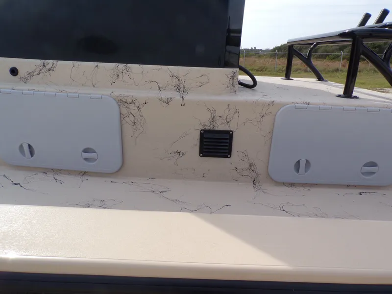 Slide: The Image of Close-up of Shoalwater 23' Catamaran 2026 with marbled design. - 11