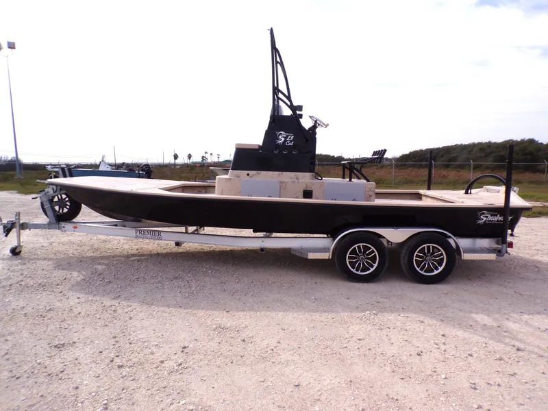 Slide: The Image of 2026 Shoalwater 23' Catamaran on trailer, side view. - 13
