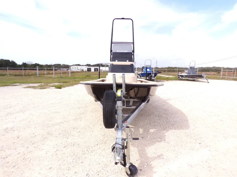 Slide: The Image of 2026 Shoalwater 23' Catamaran on trailer, front view. - 14