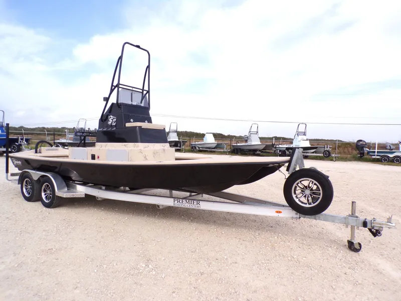 Slide: The Image of 2026 Shoalwater 23' Catamaran on trailer outdoors. - 16