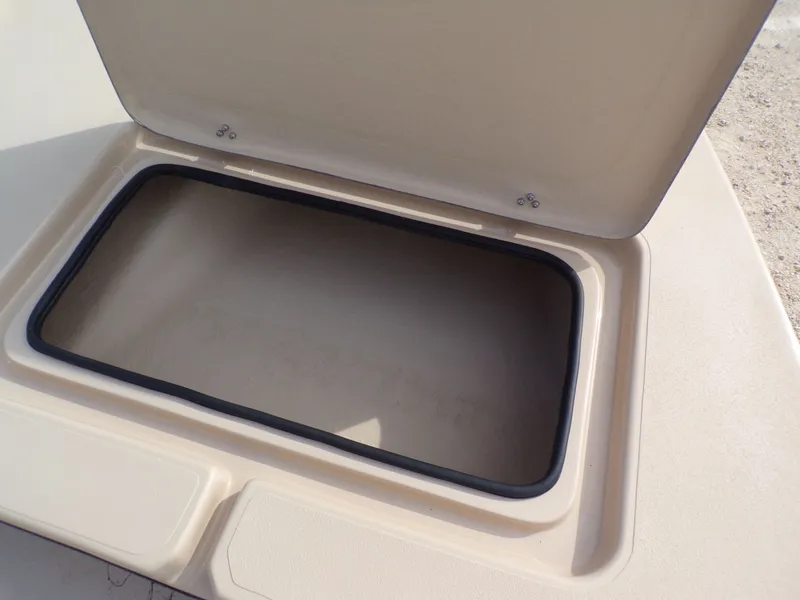Slide: The Image of Open storage compartment on Shoalwater 23' Catamaran 2026. - 24