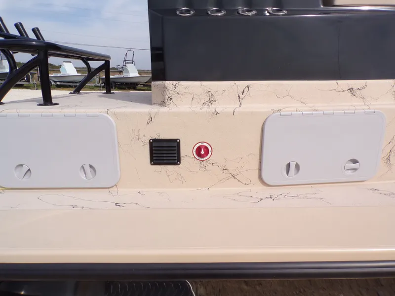 Slide: The Image of Rear view of a 2026 Shoalwater 23' Catamaran. - 32