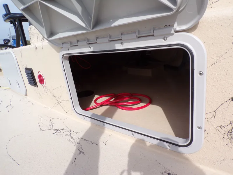 Slide: The Image of Storage compartment of a 2026 Shoalwater 23' Catamaran. - 33
