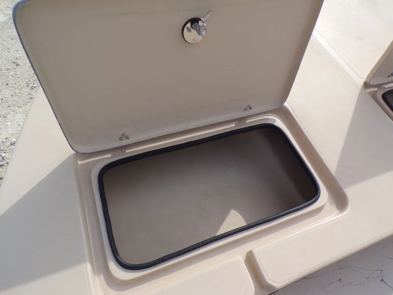Slide: The Image of Open storage compartment on a 2026 Shoalwater 23' Catamaran. - 7