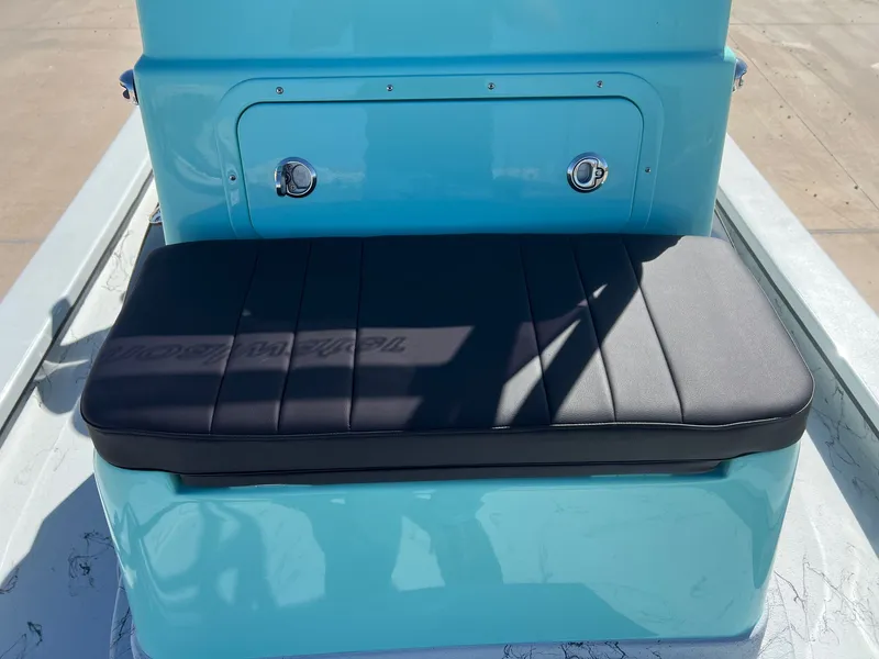 Slide: The Image of 2026 Shoalwater 23' Catamaran seat in blue and black. - 21