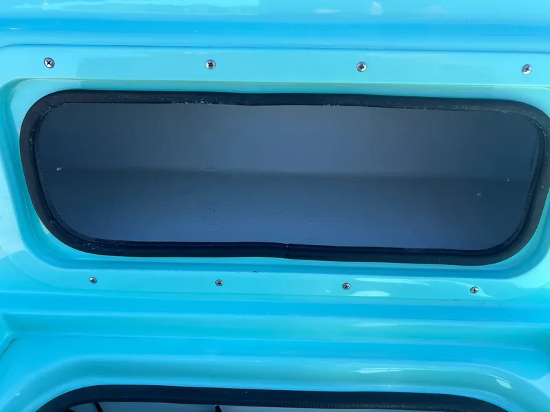 Slide: The Image of Storage compartment of a 2026 Shoalwater 23' Catamaran. - 23