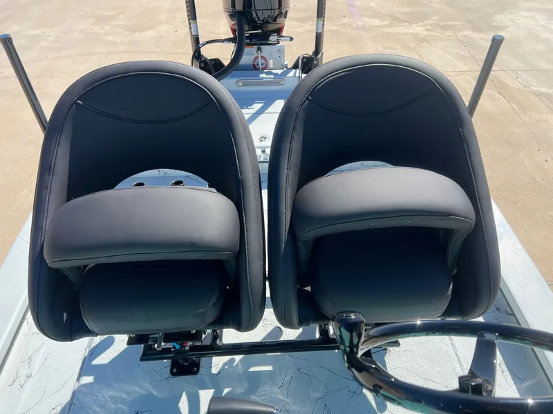 Slide: The Image of Two seats on a 2026 Shoalwater 23' Catamaran. - 26