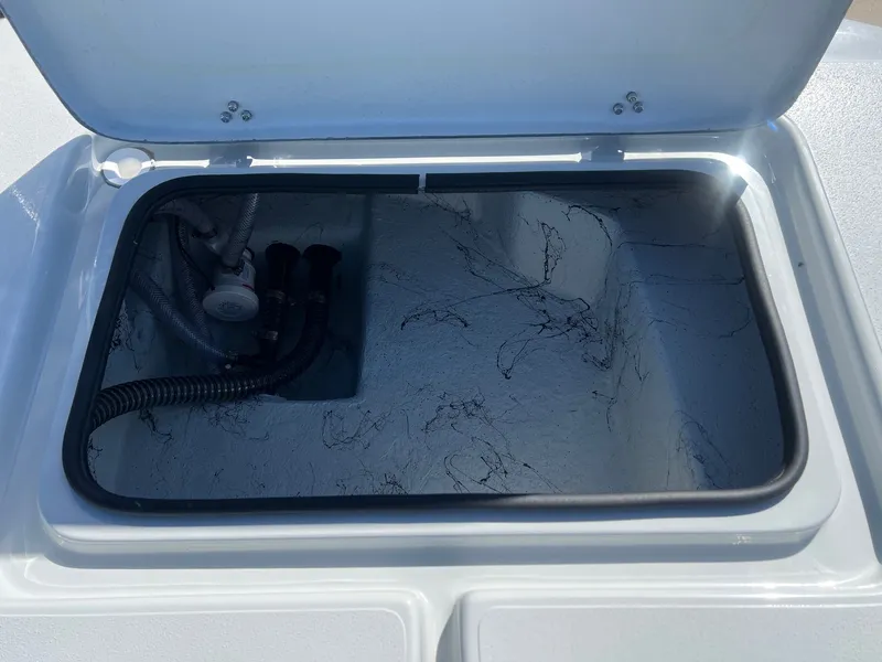 Slide: The Image of Open storage compartment in Shoalwater 23' Catamaran 2026. - 32