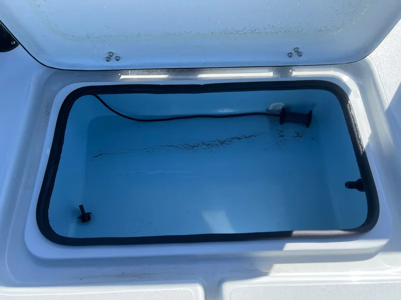 Slide: The Image of Open storage compartment in Shoalwater 23' Catamaran 2026. - 33