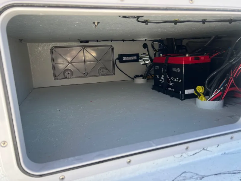 Slide: The Image of Battery compartment of a 2026 Shoalwater 23' Catamaran. - 35