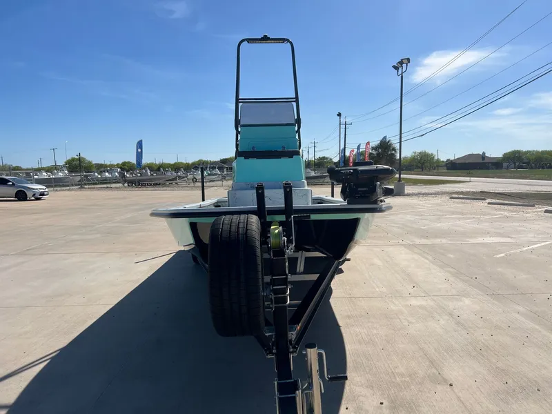 Slide: The Image of 2026 Shoalwater 23' Catamaran on trailer outdoors. - 5