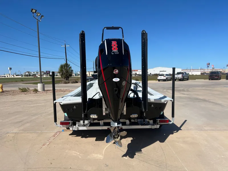 Slide: The Image of Rear view of a 2026 Shoalwater 23' Catamaran on a trailer. - 9