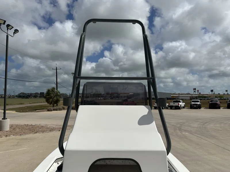 Slide: The Image of Shoalwater 23' Catamaran 2026 on parking lot under cloudy sky. - 14