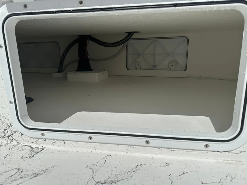 Slide: The Image of Interior view of a Shoalwater 23' Catamaran, year 2026. - 16