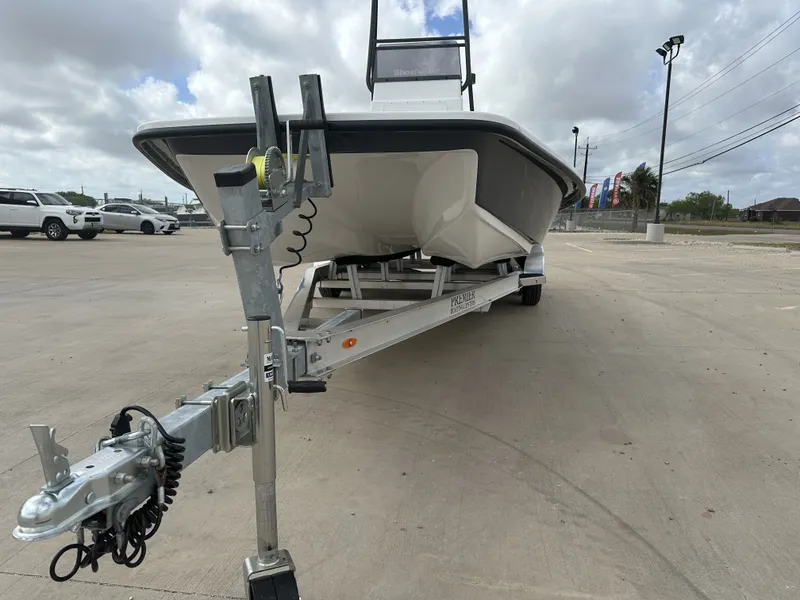 Slide: The Image of 2026 Shoalwater 23' Catamaran on trailer, parking lot view. - 5