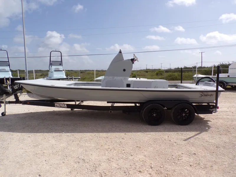 The Image of 2026 Shoalwater 23' Catamaran on trailer, side view. - 1