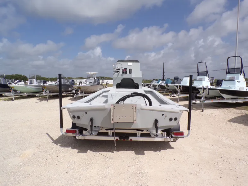 Slide: The Image of 2026 Shoalwater 23' Catamaran on a boat trailer. - 10
