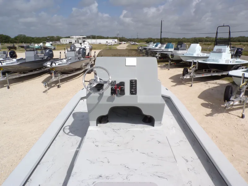 Slide: The Image of 2026 Shoalwater 23' Catamaran on a boat lot. - 13