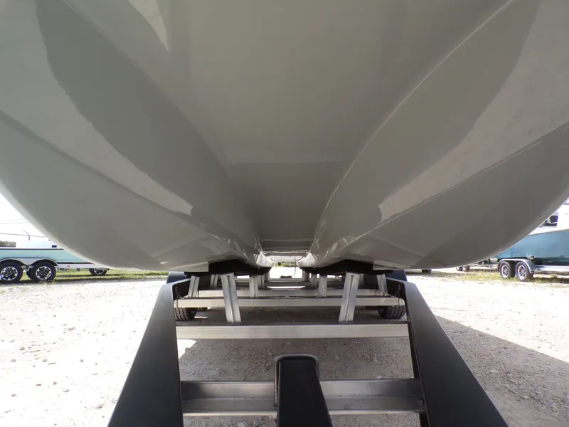 Slide: The Image of Underside of a 2026 Shoalwater 23' Catamaran on a trailer. - 6