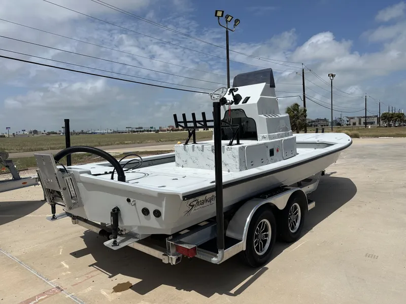 Slide: The Image of 2026 Shoalwater 23' Catamaran on trailer, sunny day. - 9
