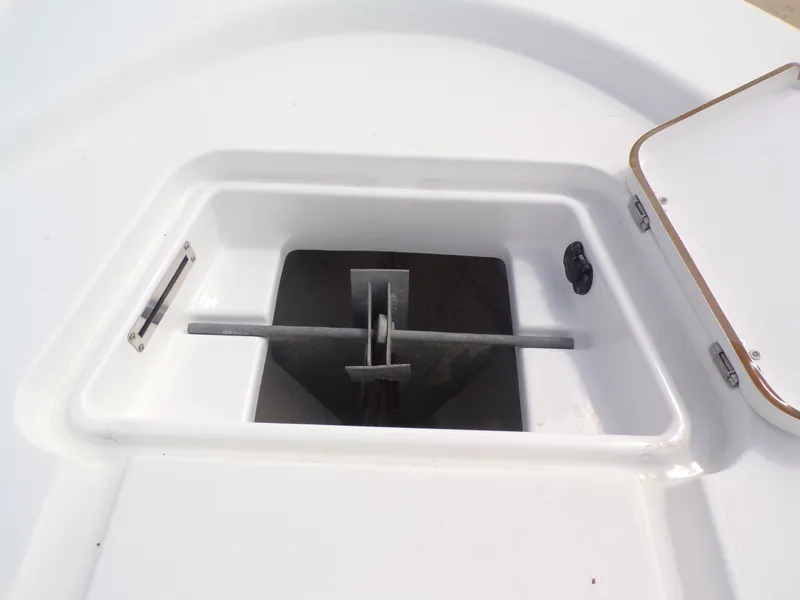 Slide: The Image of Anchor compartment of a 2016 Sportsman 207 Masters boat. - 10