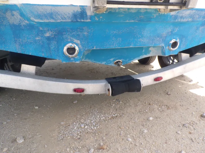 Slide: The Image of Rear view of a blue 2016 Sportsman 207 Masters boat on a trailer. - 19