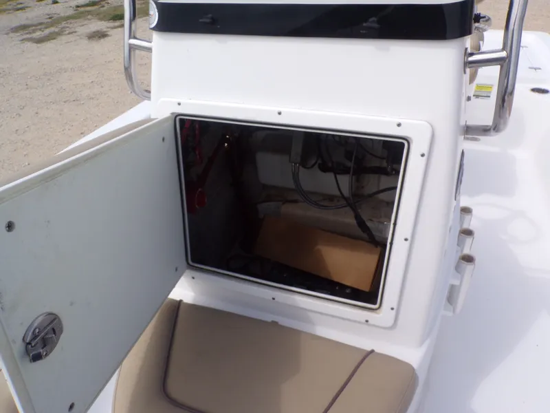 Slide: The Image of Open storage compartment on a 2016 Sportsman 207 Masters boat. - 22