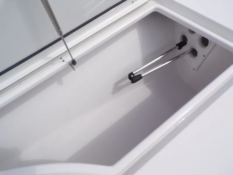 Slide: The Image of Interior view of a 2016 Sportsman 207 Masters boat storage compartment. - 24