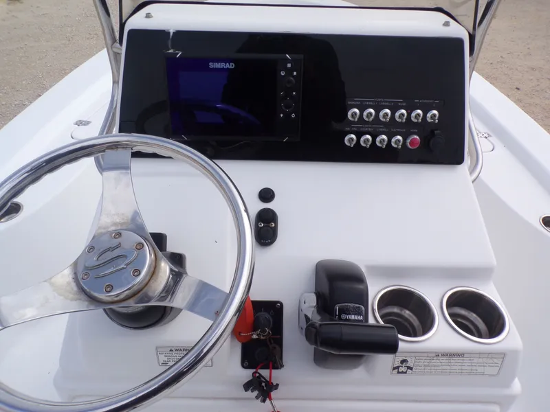 Slide: The Image of Dashboard of a 2016 Sportsman 207 Masters boat. - 30