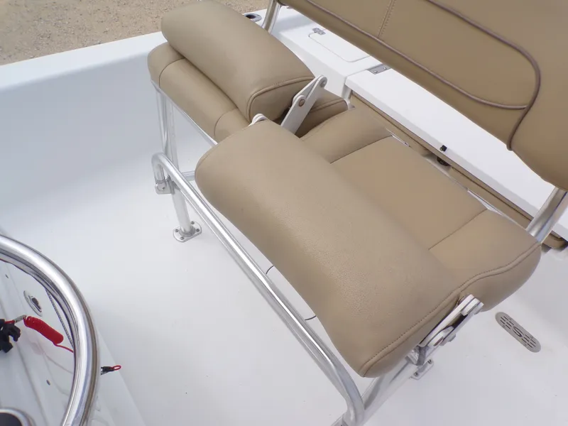 Slide: The Image of Sportsman 207 Masters 2016 boat seat with beige upholstery. - 32