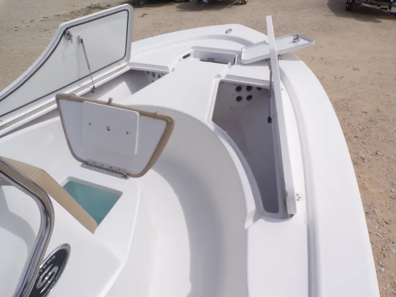 Slide: The Image of 2016 Sportsman 207 Masters boat with open storage compartments. - 7
